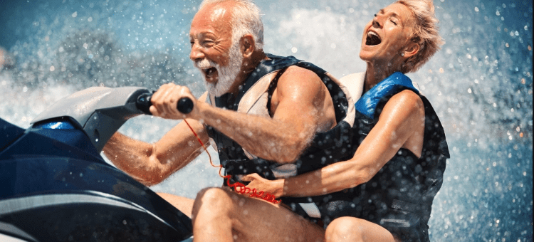 two retired people enjoying a jet ski after considering retirement